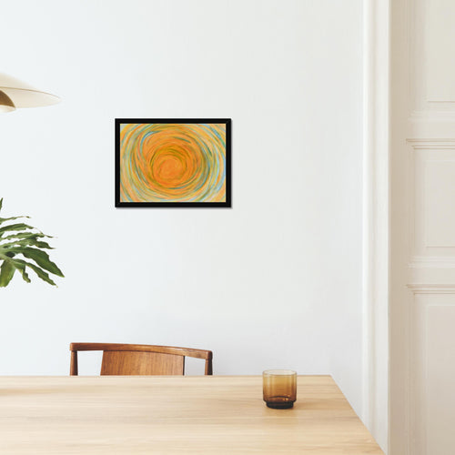 Sun Spiral framed print in a dining room